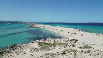 Canvas Print - Aerial shot of Formentera, Ibiza, Spain, with people on the beach and yachts in the water