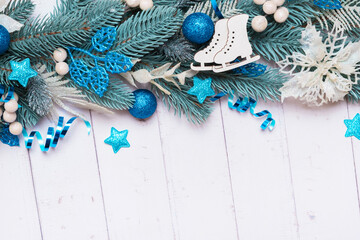 Wall Mural - Christmas background made from pine tree, berries and festive decorations top view. Christmas flat lay