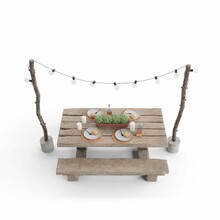 3D Render Of A Picnic Table Decorated With Hanging Lights And Cutlery Isolated On A White Background
