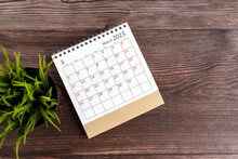 March 2023 Desk Calendar On Wooden Background
