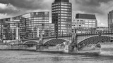 Fototapeta  - London Bridge and modern buildings over Thames River
