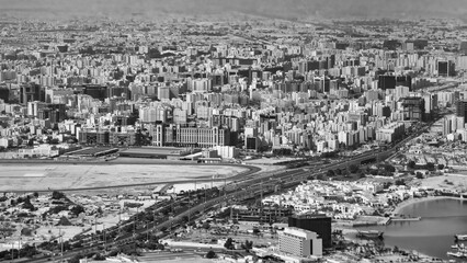 Poster - Doha, Qatar. Aerial view of city skyline from a flying airplane over the Qatar capital