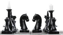 Wooden Chess Figures On A Classic Chessboard