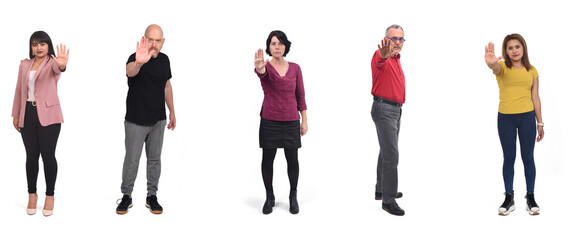 Wall Mural - group of people showing the stop sign with their hands on white background