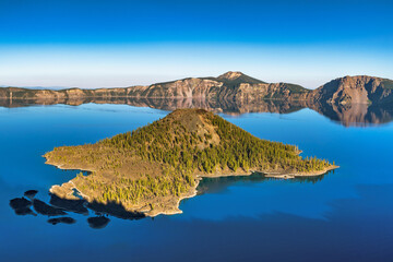 Wall Mural - view of crater lake on a clear and calm summer evening.