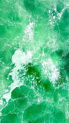 Textured green background background stormy water Abstract shapes of a white foam on an aquamarine sea water surface. High quality photo