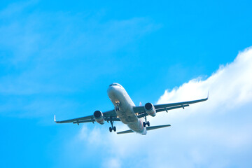 Airplanes, passengers flying in the sky, preparing to land at the airport