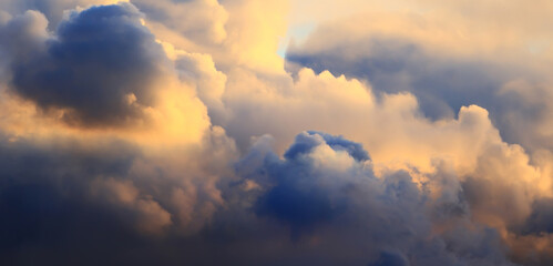 Wall Mural - sunset background cumulus clouds abstract