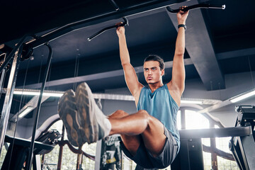 Poster - Fitness, exercise and weight training with a man at gym for a workout for focus and strong body and mindset for health and wellness. Bodybuilder or athlete using pull up bar for power and muscle