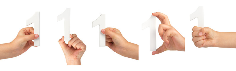 Aufkleber - Number one in a hand isolated on a black background. Big set PNG. Number one white in a child's hand on a black background