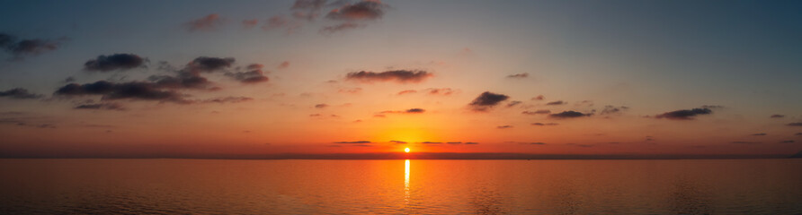 Wall Mural - Dramatic Colorful Sunset Sky over Mediterranean Sea. Cloudscape Nature Background. Panorama
