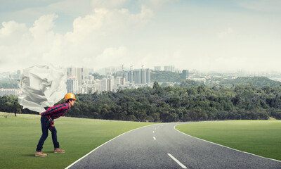 Wall Mural - Engineer man carry load