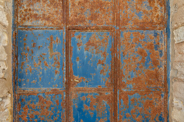 Wall Mural - Rusty metal door.