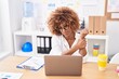 © Krakenimages.com - African american woman business worker suffering for wrist pain working at office