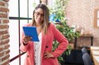 © Krakenimages.com - Young hispanic woman business worker using touchpad at office