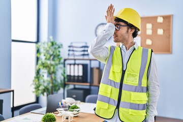 Poster - Hispanic man wearing architect hardhat surprised with hand on head for mistake, remember error. forgot, bad memory concept.