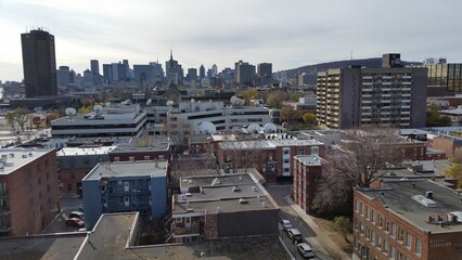 Wall Mural - a dense mixed use area outside of downtown montreal, visible from the bridge