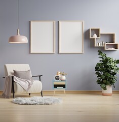 Poster mockup with vertical frames on empty dark wall in living room interior.