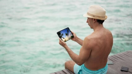 Fototapete - Watching Video Online On Tablet Computer