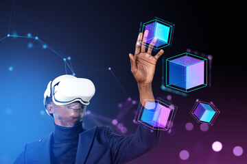 African American businessman wearing vr headset touching digital