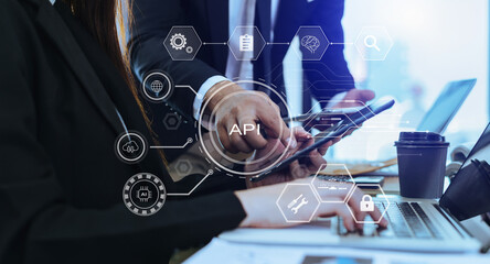 Wall Mural - api - application programming interface, woman using laptop, tablet and smartphone with virtual scre