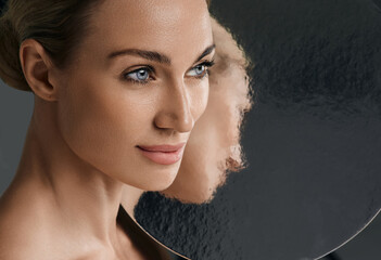 beauty portrait of woman with perfect and shiny skin. concept of skin care and aesthetic cosmetology