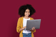 © Prostock-studio - Adorable black girl schooler using modern computer
