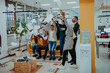 © .shock - Group of business people throwing paper in air at modern startup office, team success and job done concept