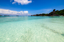 Clear Sea With White Cloudy And Blue Sky At Similan Island, Phang-nga Thailand,