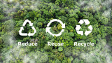 Fototapeta  - Reduce, reuse, recycle symbol in the middle of a beautiful untouched jungle. Ecological concept. An ecological metaphor for ecological waste management and a sustainable and economical lifestyle.