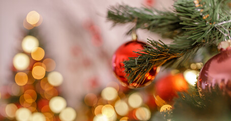  Beautiful holiday decorated room with Christmas tree and bright lights , out of focus shot for photo background. Blur christmas background