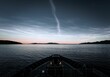 Beautiful shot of a calm sea from a boat in the evening in Alaska