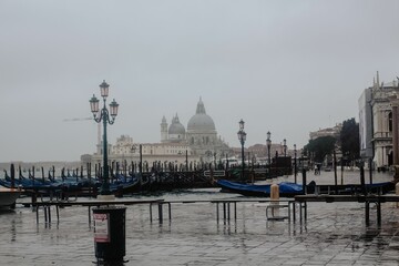 Poster - Beautiful view of Saint Mark's Basilica with the front harbor during a foggy weather