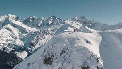 Canvas Print - Person skiing in the snowy mountains