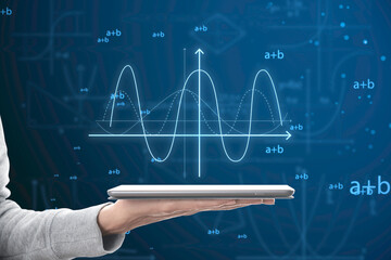 Wall Mural - Close up of female hand holding cellphone with abstract glowing mathematical formula graph on blue background. Equation, digital data and mathematics app concept.