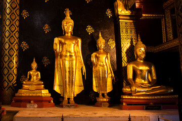 Golden buddha statue for thai people and foreign travelers travel visit respect praying and blessing holy myth at Wat Phra Si Rattana Mahathat or Yai Temple on October 28, 2022 in Phitsanulok Thailand