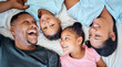 © David L/peopleimages.com - Top view, family or children bonding in bedroom of house, home or relax hotel in trust, love and security support. Smile, happy or laughing kids with parents, father or mother in Indonesian apartment