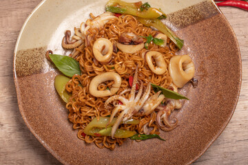 Wall Mural - Stir-fried Squid with Basil and Chilli Instant Noodles