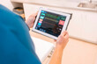 © Westend61 - Hands of doctor examining data on tablet PC at hospital
