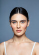 © Dragosh - Beauty Woman face Portrait. Beautiful Spa model Girl with Perfect Fresh Clean Skin. Brunette female looking at camera and smiling.
