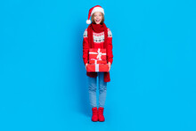 Full Length Photo Of Sweet Excited School Girl Wear Red Xmas Ornament Sweater Getting Presents Stack Pile Isolated Blue Color Background
