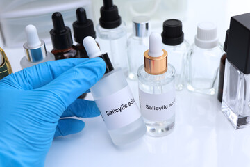 Wall Mural - salicylic acid in a bottle, chemical ingredient in beauty product