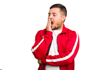 Canvas Print - Young caucasian man isolated yawning showing a tired gesture covering mouth with hand.