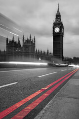 Fototapete - Big Ben during a evening with lights of cars on the bridge in London, England, United Kingdom