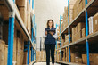 © Jacob Lund - Woman using a digital warehouse management system