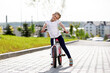 © Ruslan Ivantsov - Little girl on a bicycle in summer park. cycling outdoors