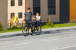 © Ruslan Ivantsov - father riding bike with son in bike seat