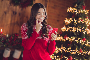 Photo of cute dreamy lady blogger use gadget choose gifts dream new iphone finger lips interesting offer magic time room indoors house