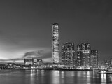 Fototapeta  - Scenery of skyscraper, skyline and harbor of Hong Kong city at dusk
