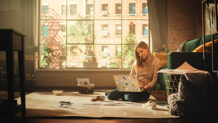 Poster - Beautiful Woman Using Laptop at Home and Working Remotely. Young Adult Woman Smiling and Sitting on the Floor Using Internet, Writing Report, Finishing Project. Good Sunny Day for Productive Work.